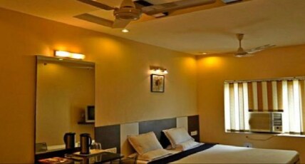 TRIBENI HOTEL Room Type - Deluxe King Bed