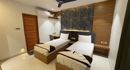 SHREE RESIDENCY Room Type - Deluxe Twin AC Room