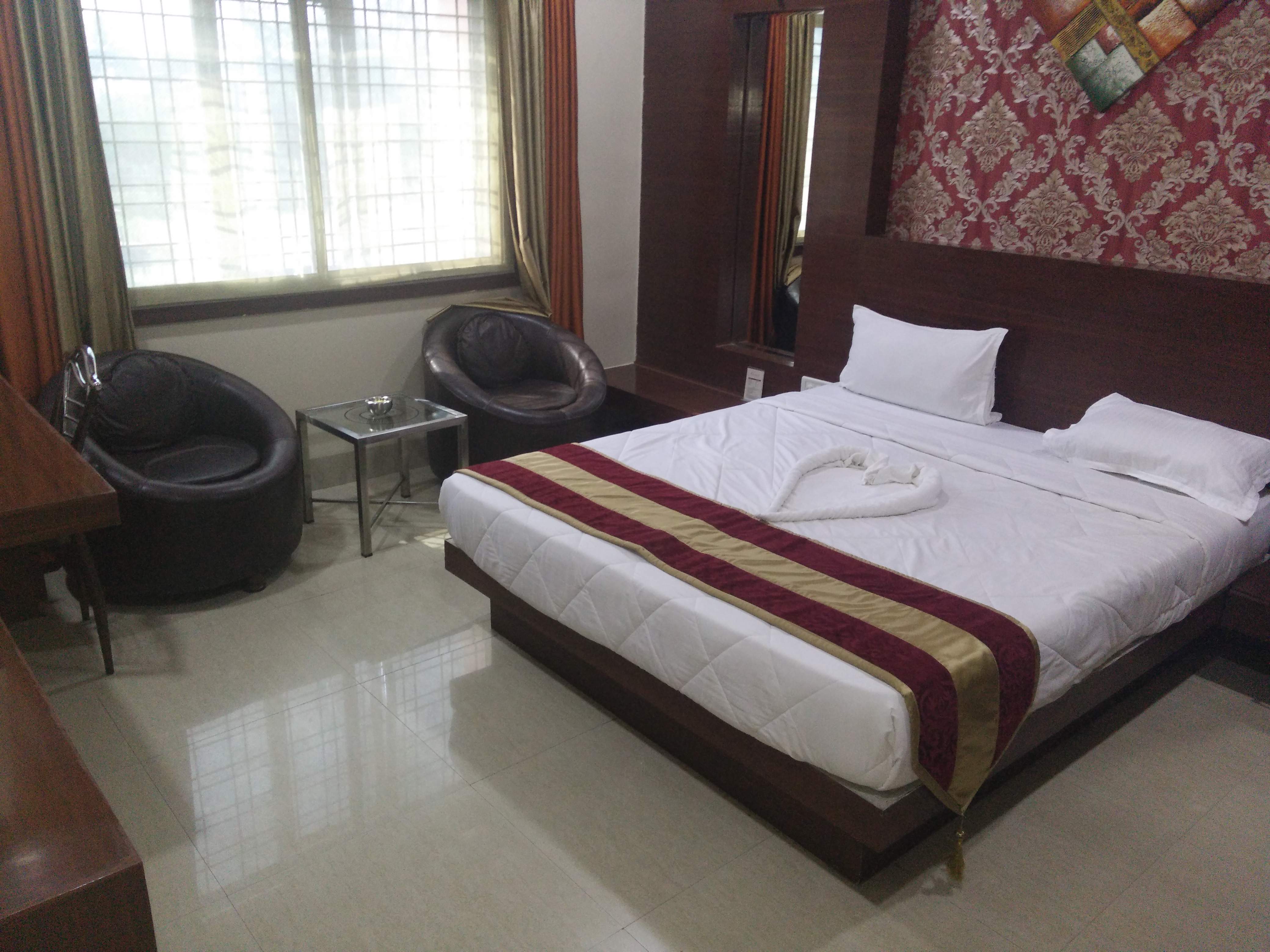 Hotel Shri Khedapati International - Tap to explore photos