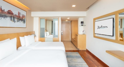Radisson Hotel Gurugram Sohna Road City Center Room Type - Smart Business Stay (Standard Room) Radisson Hotel Gurugram Sohna Road City Center Room Type - Smart Business Stay (Standard Room)