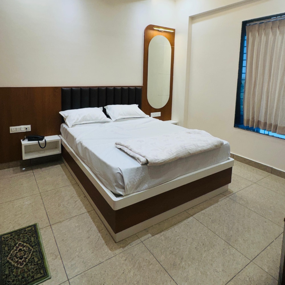 Rudraksh Hotel Garden & Restaurant - Tap to explore photos