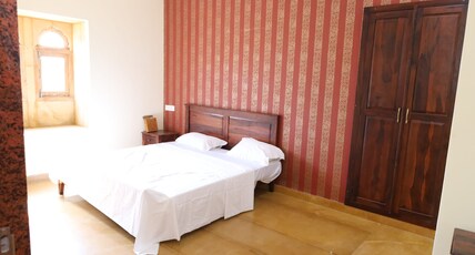 Mahadev Residency Room Type - Deluxe Room