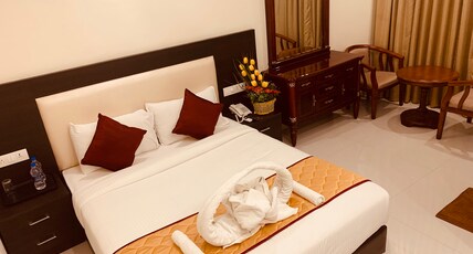 Spago Inn-Only for Families & Couples not for Bachelors Room Type - Deluxe Room