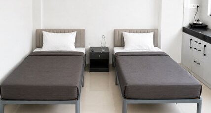Z Express Isle of Life Room Type - Deluxe Twin | Studio Room | Kitchenette | AC | TV | Balcony
