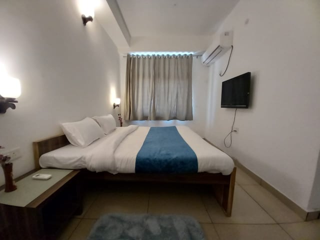 Cozy Nest Home Stay - Tap to explore photos