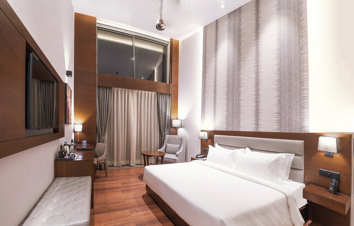 The Rosefinch Sarovar Portico - Tap to explore photos