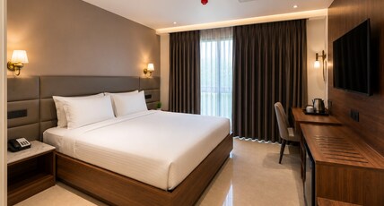 Clubhouse Hotel by CheckIn Greater Noida Room Type - Deluxe Room
