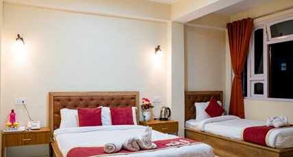 The Parasol INN Sikkim Room Type - Executive Triple Bed Room The Parasol INN Sikkim Room Type - Executive Triple Bed Room