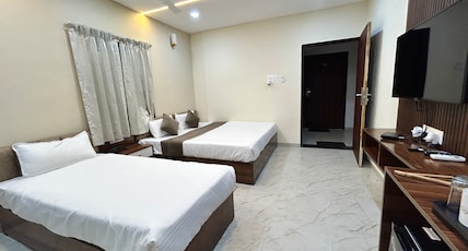 HOTEL MM PRESTIGE RAIPUR Room Type - Deluxe 1 Double and 1 Single Bed Room