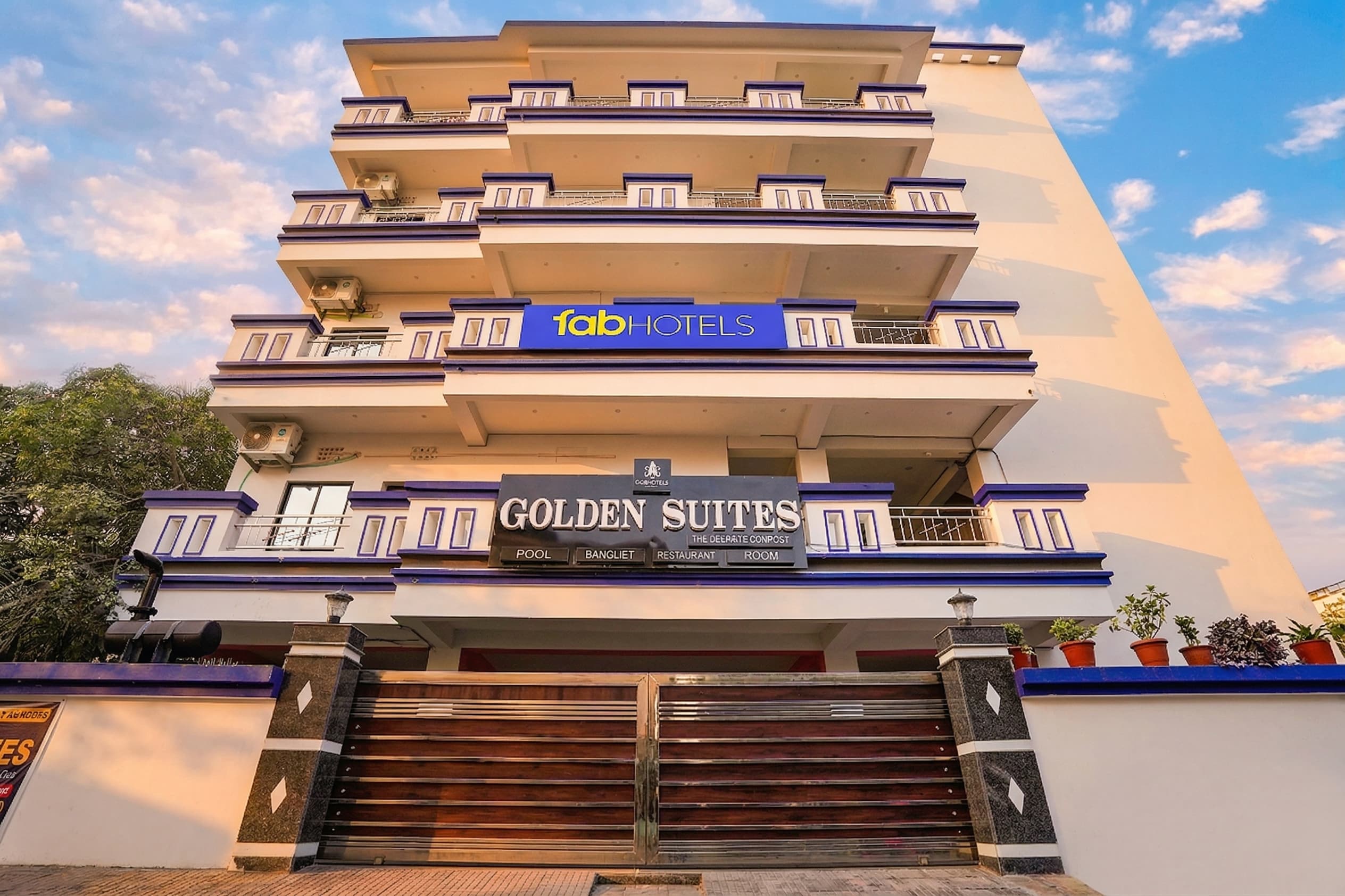 FabHotel Golden Suites Near Puri Beach - Tap to explore photos