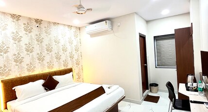Hotel Mithra Grand Room Type - DELUXE ROOM