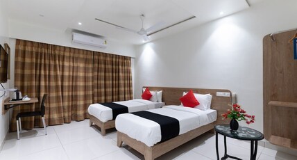 Aashro Akshar Inn Room Type - Ideal Room