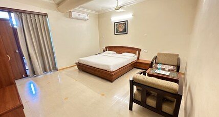 Hotel Sudhir New ( 900 metres from Nakki lake ) Room Type - Deluxe Double bed AC Room ( Only For Families & Couples)