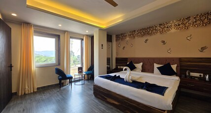 The kanak valley hotel Room Type - King Bed Room with Hill View