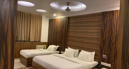 THE RAVINDRAM Room Type - Superior Room (1King & 1 Single Bed)