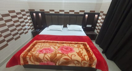 KESAR RESIDENCY Room Type - Deluxe Double