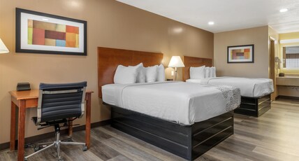 SureStay Plus Hotel By Best Western Poteau Room Type - 2 Queen Beds, Non-Smoking, Flat Screen Television, Dining Table, High Speed Internet Access, Microwa SureStay Plus Hotel By Best Western Poteau Room Type - 2 Queen Beds, Non-Smoking, Flat Screen Television, Dining Table, High Speed Internet Access, Microwa