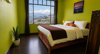 Eagle Point Homestay | Rajbari Room Type - Deluxe Double Bed Room ( No balcony) ( but Kangchenjunga view from the window ) Eagle Point Homestay | Rajbari Room Type - Deluxe Double Bed Room ( No balcony) ( but Kangchenjunga view from the window )