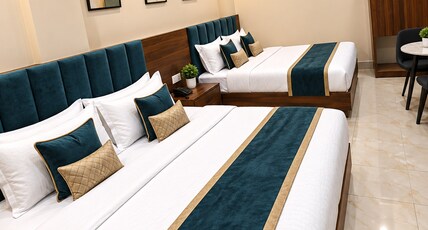Hotel Neelam Palace Near New Delhi Station & Connaught Place Room Type - Deluxe Family Four Bed AC Room With Free Wi-Fi & Smart TV