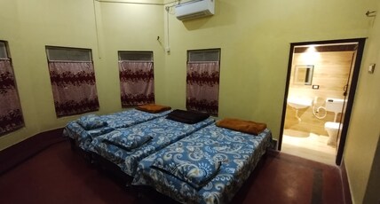 BeQuest Stays Room Type - Ac Room With 3 Single Beds attached Bathroom Garden View