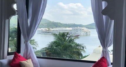 Nirvana Haveli by the Lake Pichola Room Type - King suite with Lake View and Bathtub.