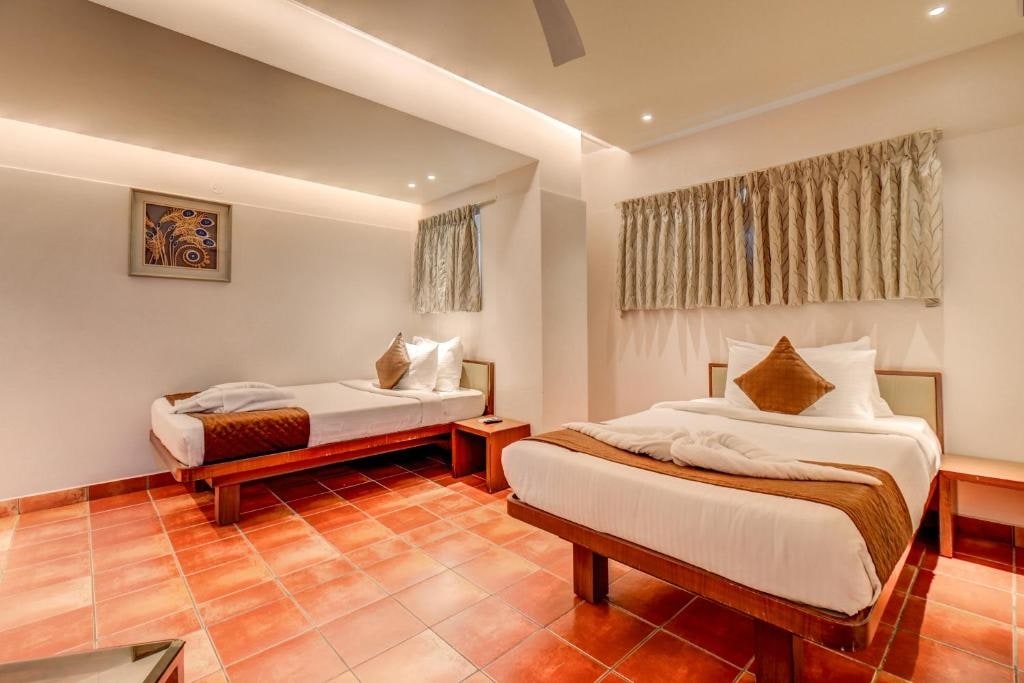 Hotel J N Stay Mysore - 12 Minutes to Mysore Palace - Tap to explore photos