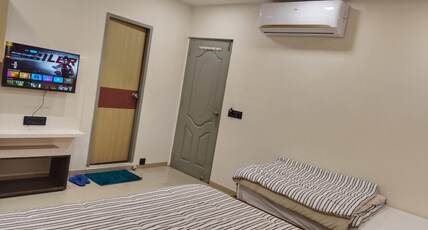 LALJI'S HOTEL & RESTAURANT Room Type - triple bed room