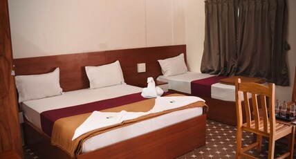 HOTEL UDUPI VAIBHAV Room Type - TWIN BED DELUXE ROOM