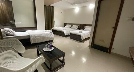 Model Grand Inn Room Type - Deluxe Quadruple Room