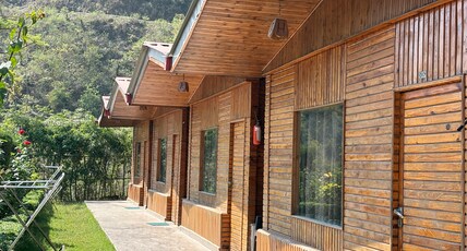 HOA Resort Room Type - Wooden AC Cottage with Sofa cum Bed