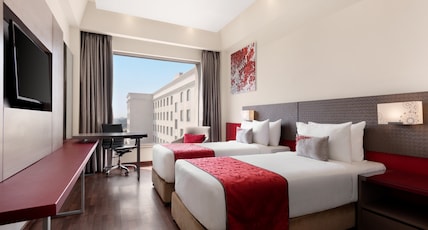 Ramada by Wyndham Lucknow Hotel and Convention Center Room Type - 2 Twin Bed Smoking Room Ramada by Wyndham Lucknow Hotel and Convention Center Room Type - 2 Twin Bed Smoking Room