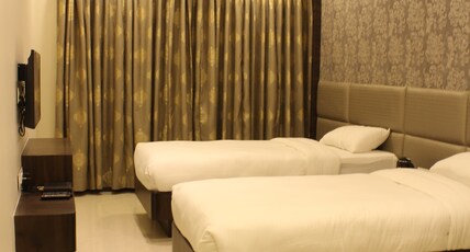 RG Landmark Room Type - Classic Rooms (Split Bed / Separated Bed) Ideal for Corporate with common washroom