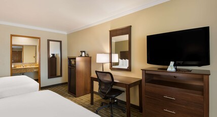 Best Western Holiday Hotel Room Type - 2 Queen Beds, Non-Smoking, High Speed Internet Access, Third Bed Is A Sofabed, Microwave And Refrige