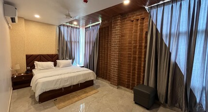 ANJANA RESORT & CONVENTION Room Type - Deluxe Room