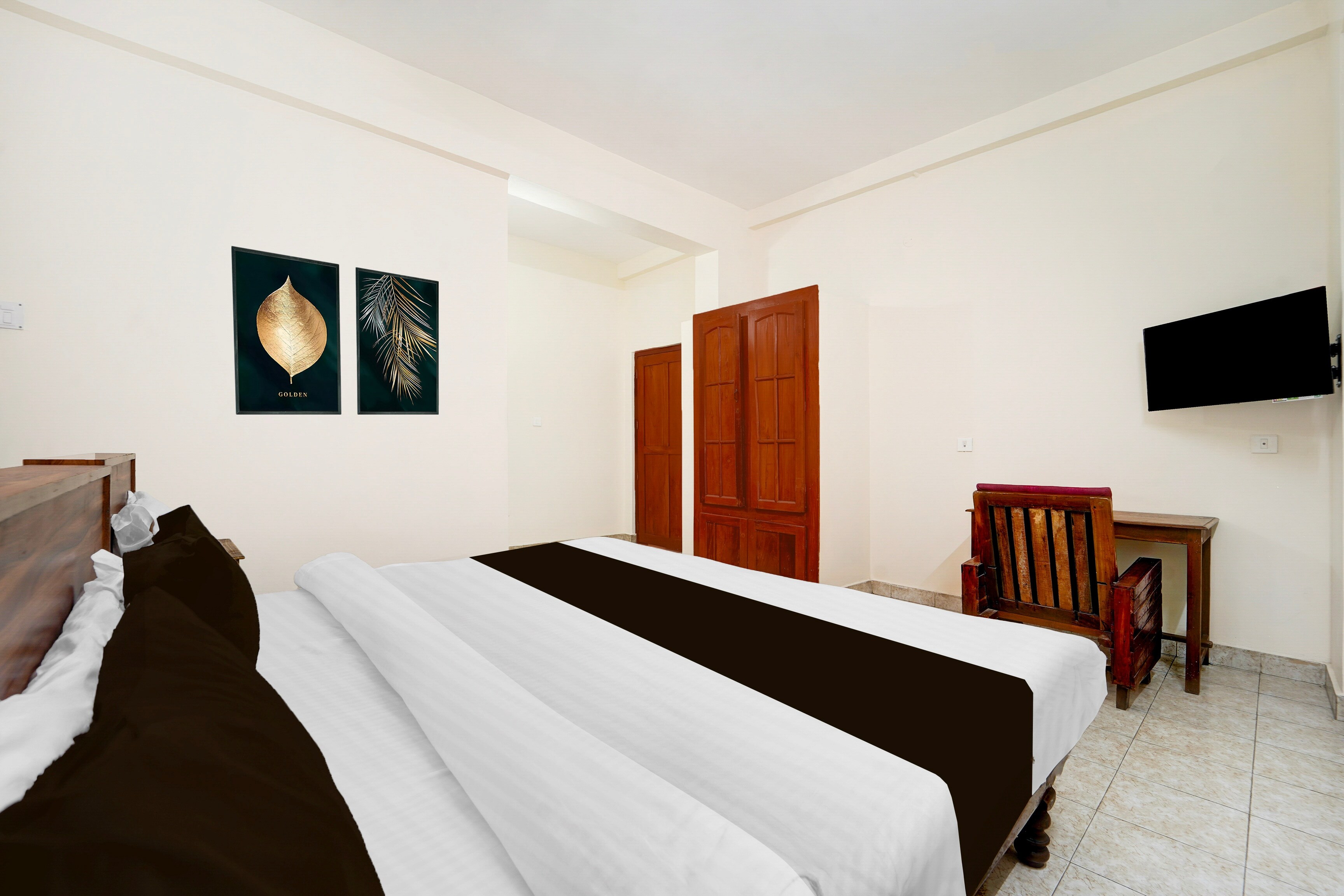 Hotel O Pathanamthitta Near Mahatma Gandhi Statue - Tap to explore photos