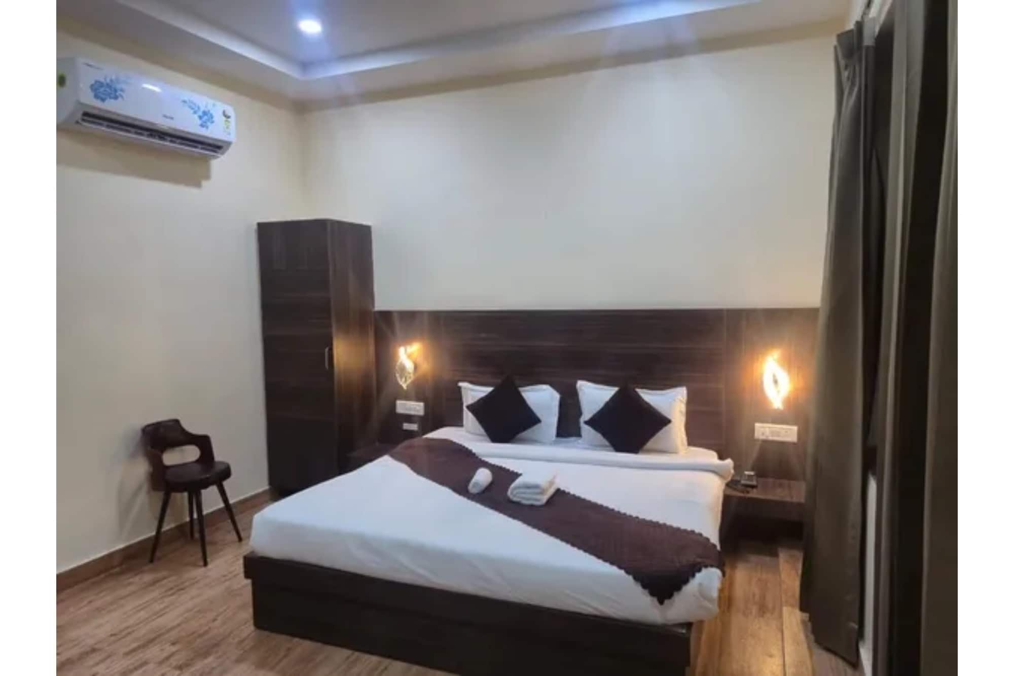 FabHotel Shubh Mangal Grand - Tap to explore photos