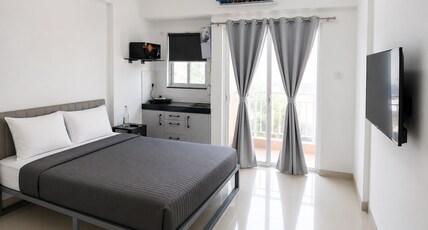 Z Express Isle of Life Room Type - Studio Queen Room | Kitchenette | AC | TV | Balcony Z Express Isle of Life Room Type - Studio Queen Room | Kitchenette | AC | TV | Balcony