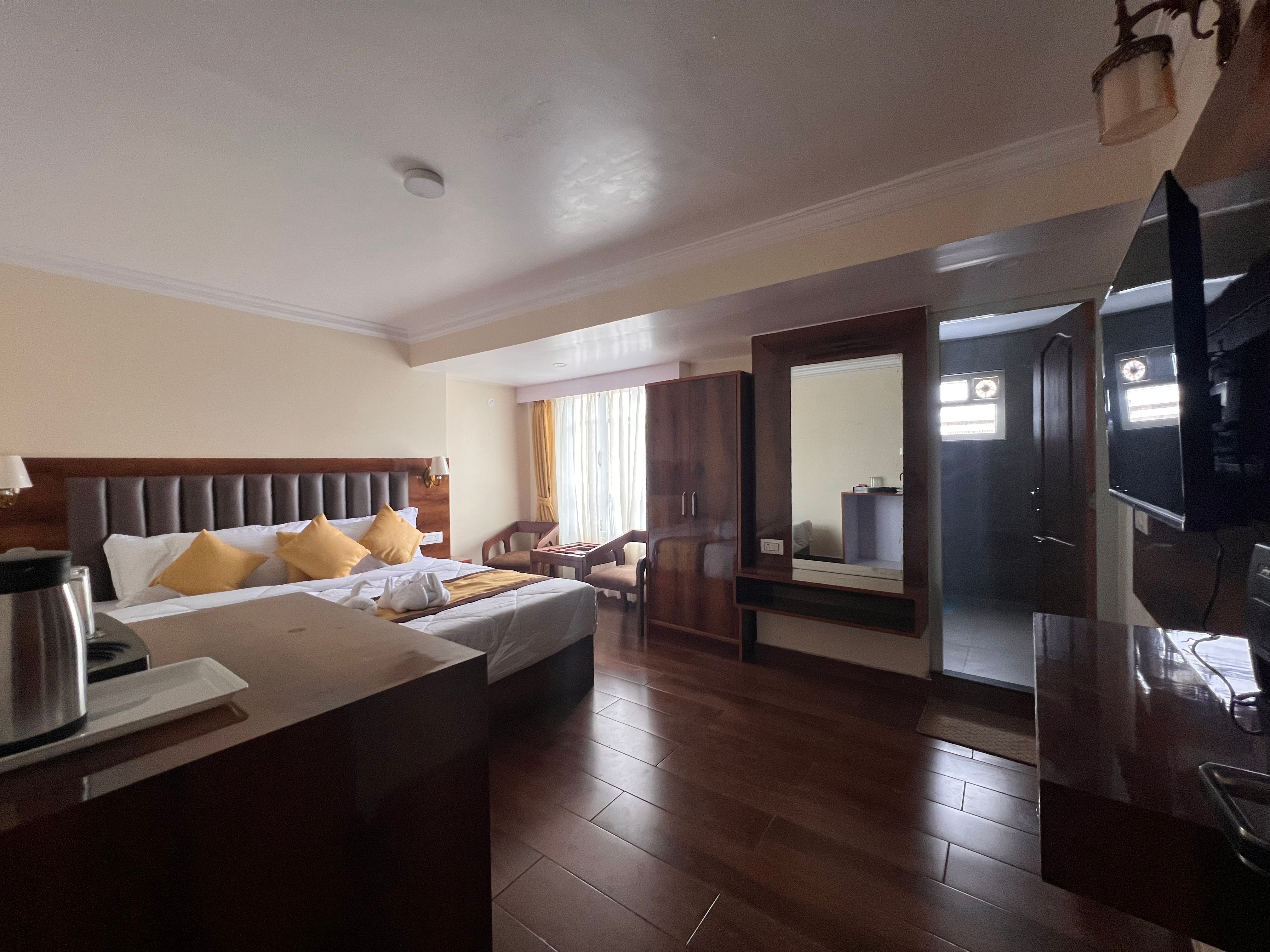 Raj Ville Hotel in Darjeeling Near Mall Road - Tap to explore photos