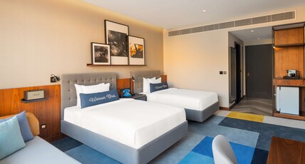 The WB Abu Dhabi, Curio Collection by Hilton - Free Theme Park Tickets Room Type - TWO DBL BEDS ARTIST ROOM
