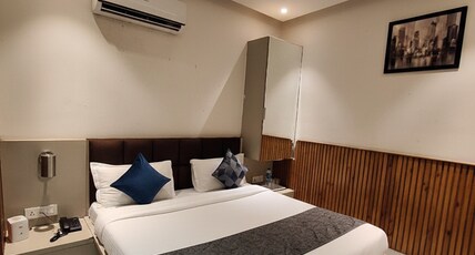 Hotel Shri Sai Deluxe | 1 Min from Adarsh Nagar Metro | Budget Stay for Couples & Families Room Type - Deluxe Room | Smooth Check-in | Clean Room & Basic Amenities