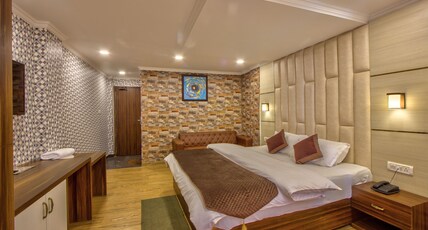 Sanveera Hotels & Resorts Room Type - Mountain View Delight Room Sanveera Hotels & Resorts Room Type - Mountain View Delight Room