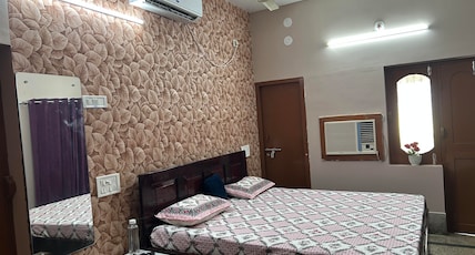 Dev Pratima Premium Residency - 4 Mins Walk To Shree Jagannath Temple Room Type - Premium Suite AC room Dev Pratima Premium Residency - 4 Mins Walk To Shree Jagannath Temple Room Type - Premium Suite AC room