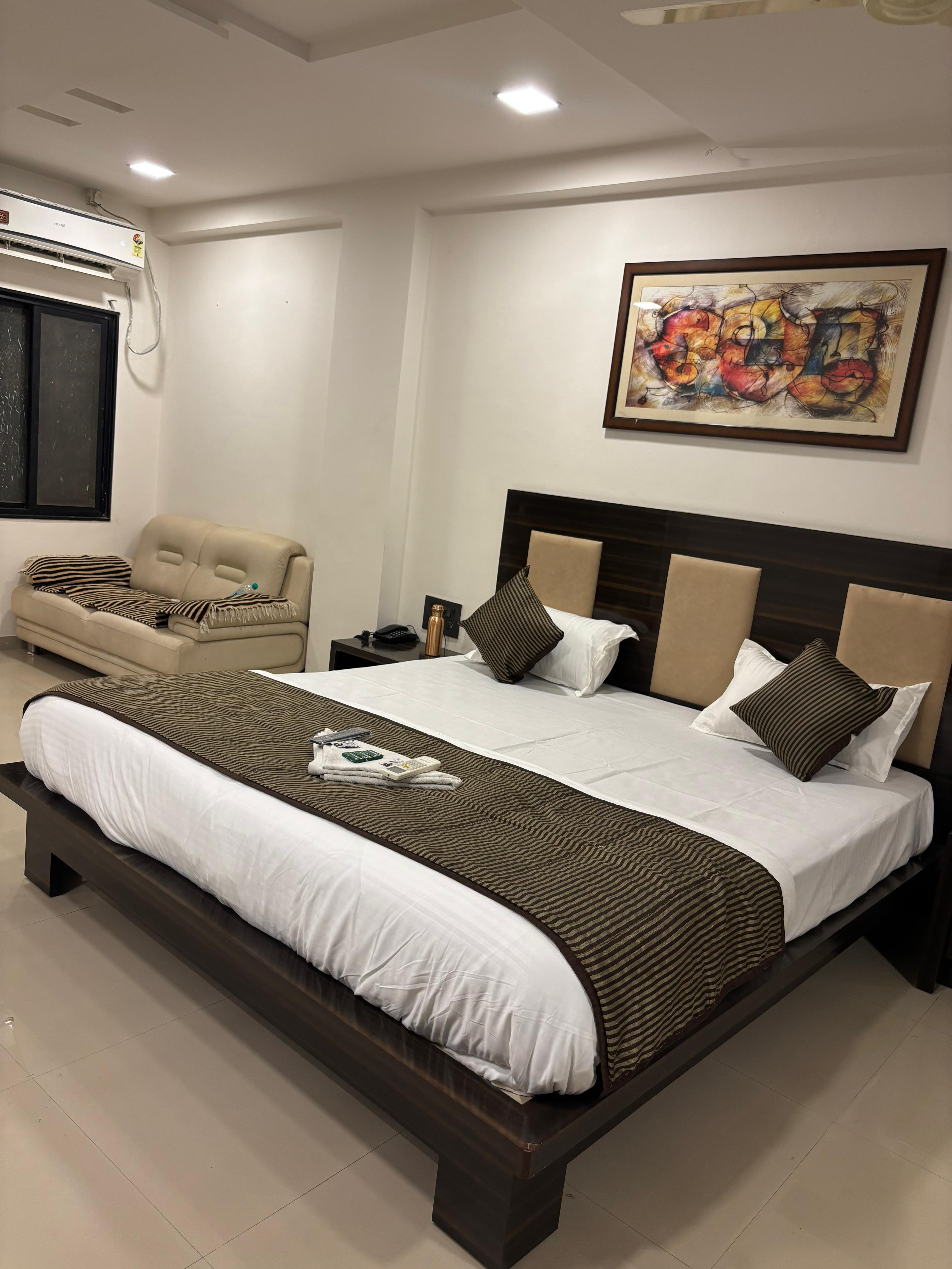Hotel Jamnagar Residency - Tap to explore photos