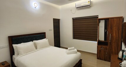 GREENS RESIDENCY Room Type - DELUXE DOUBLE BEDROOM