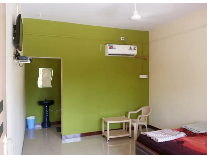 Shree Prasad Tourist Home - Tap to explore photos