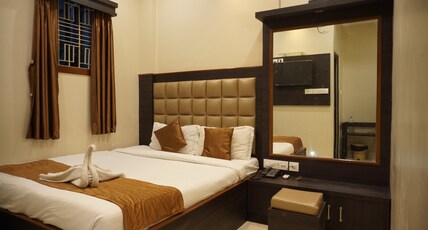 The Premier Guest House Room Type - Deluxe Room  AC