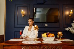 Cinematic Luxury: 3BHK Serviced Apartment with Home Theatre