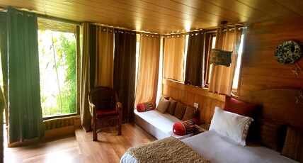 Camp PeaceTrips Room Type - Luxury Wooden Cottages