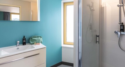 ibis budget Epinal Room Type - Standard apartment with a double bed and sofa
