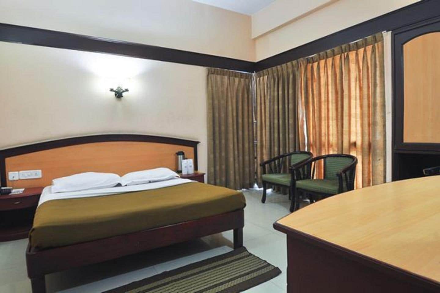 Munnar Inn - Tap to explore photos